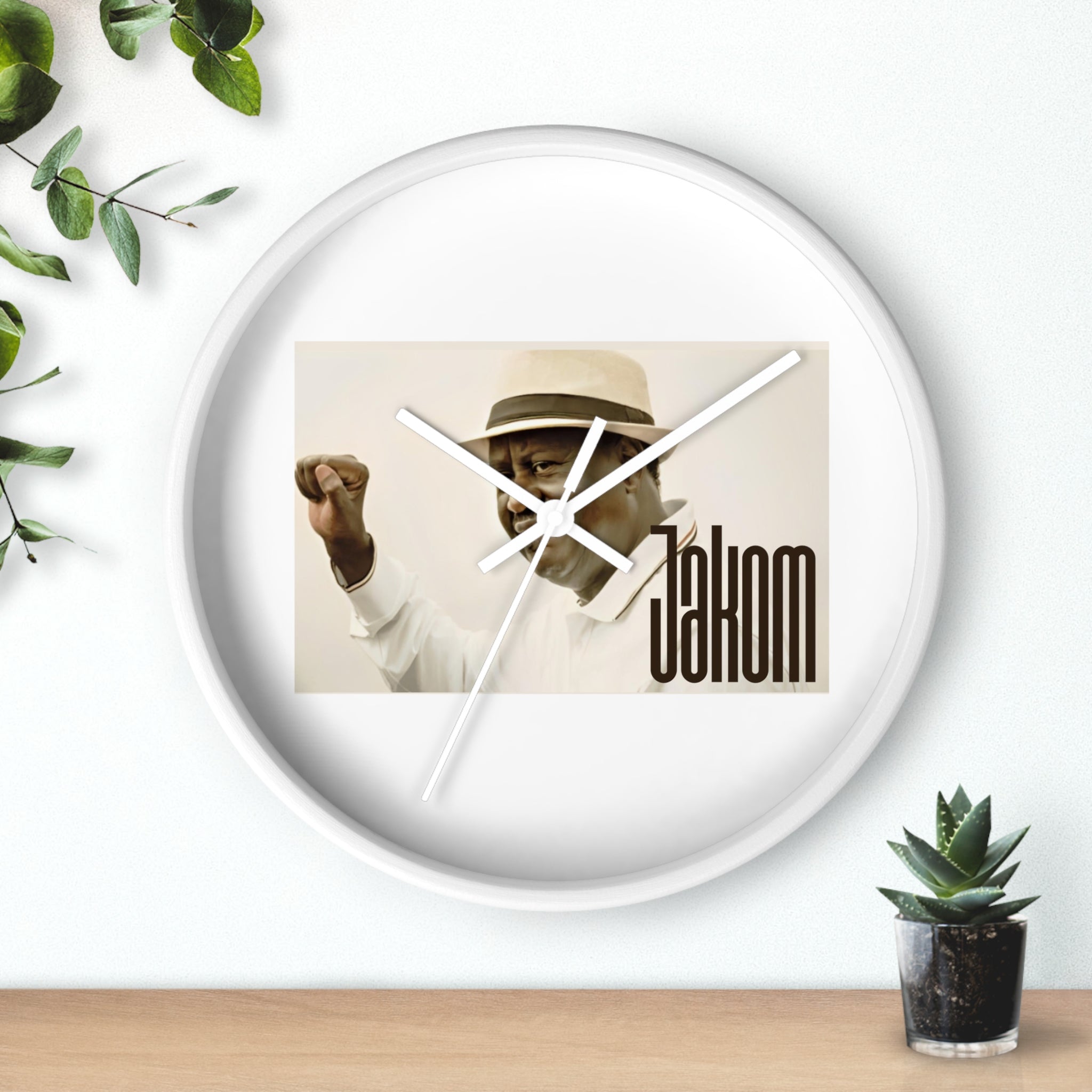 Raila Jakom 1 Wall Clock