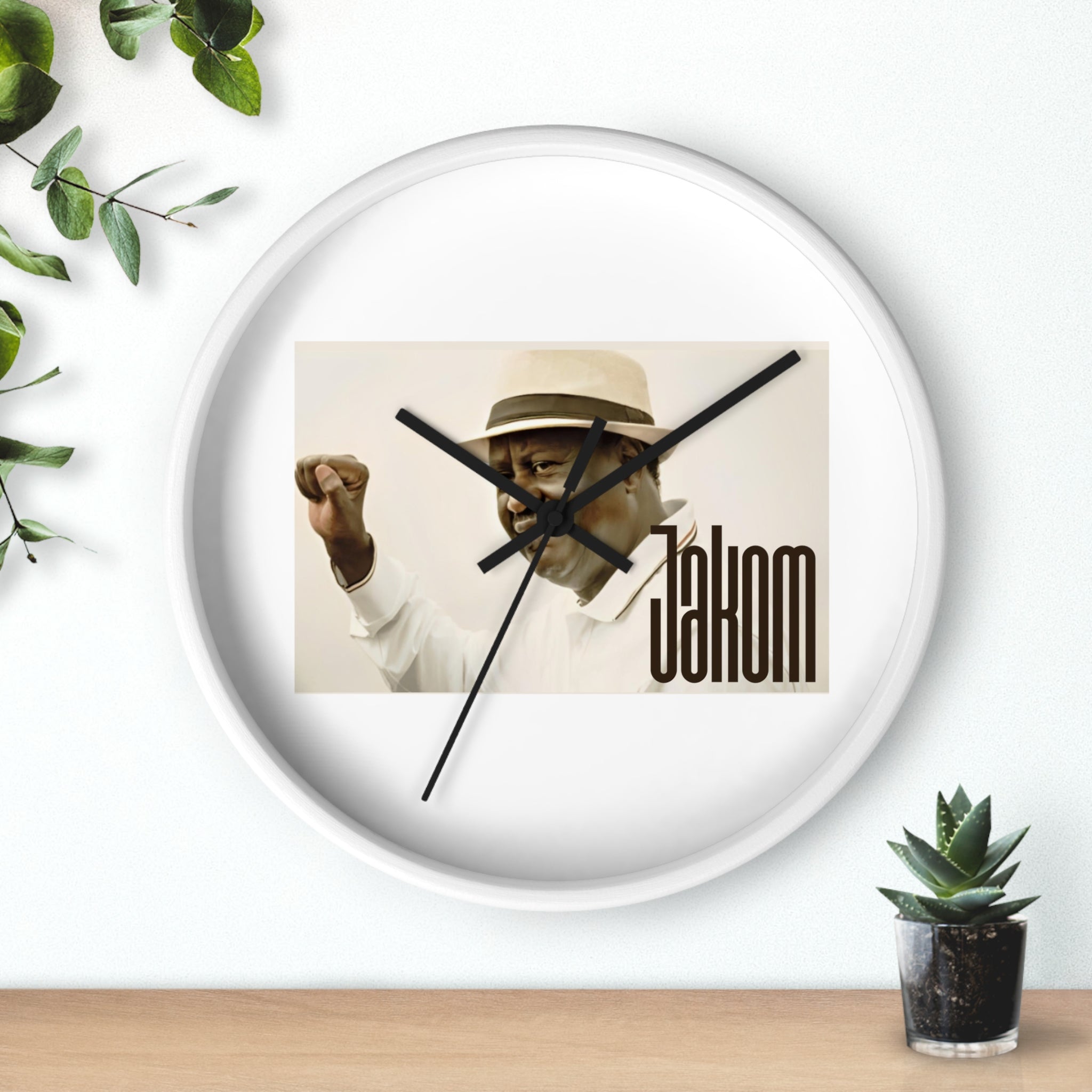 Raila Jakom 1 Wall Clock