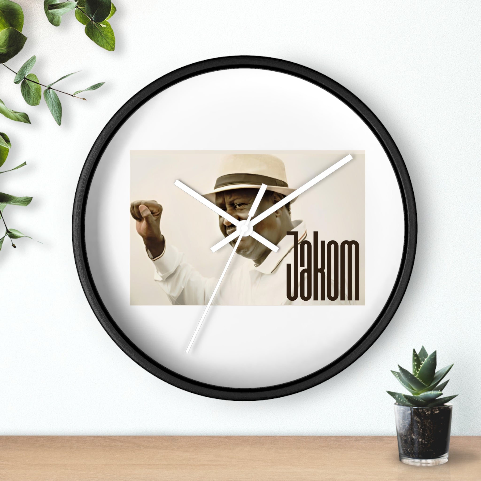 Raila Jakom 1 Wall Clock