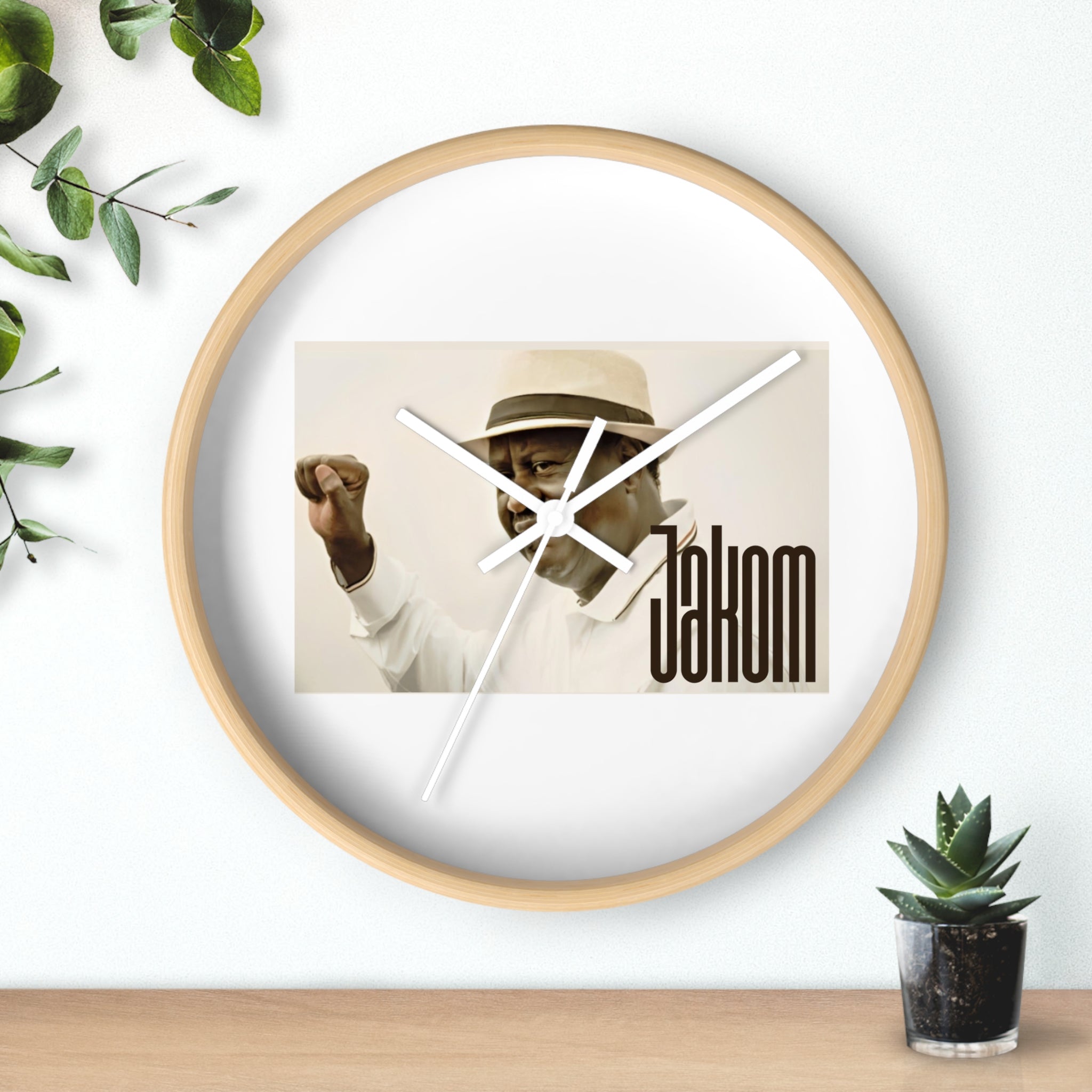 Raila Jakom 1 Wall Clock